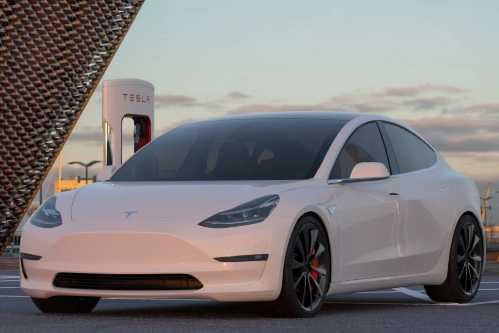 tesla model 3 per noleggio auto elettrica a lungo termine, mentre è in ricarica su colonnina dedicata